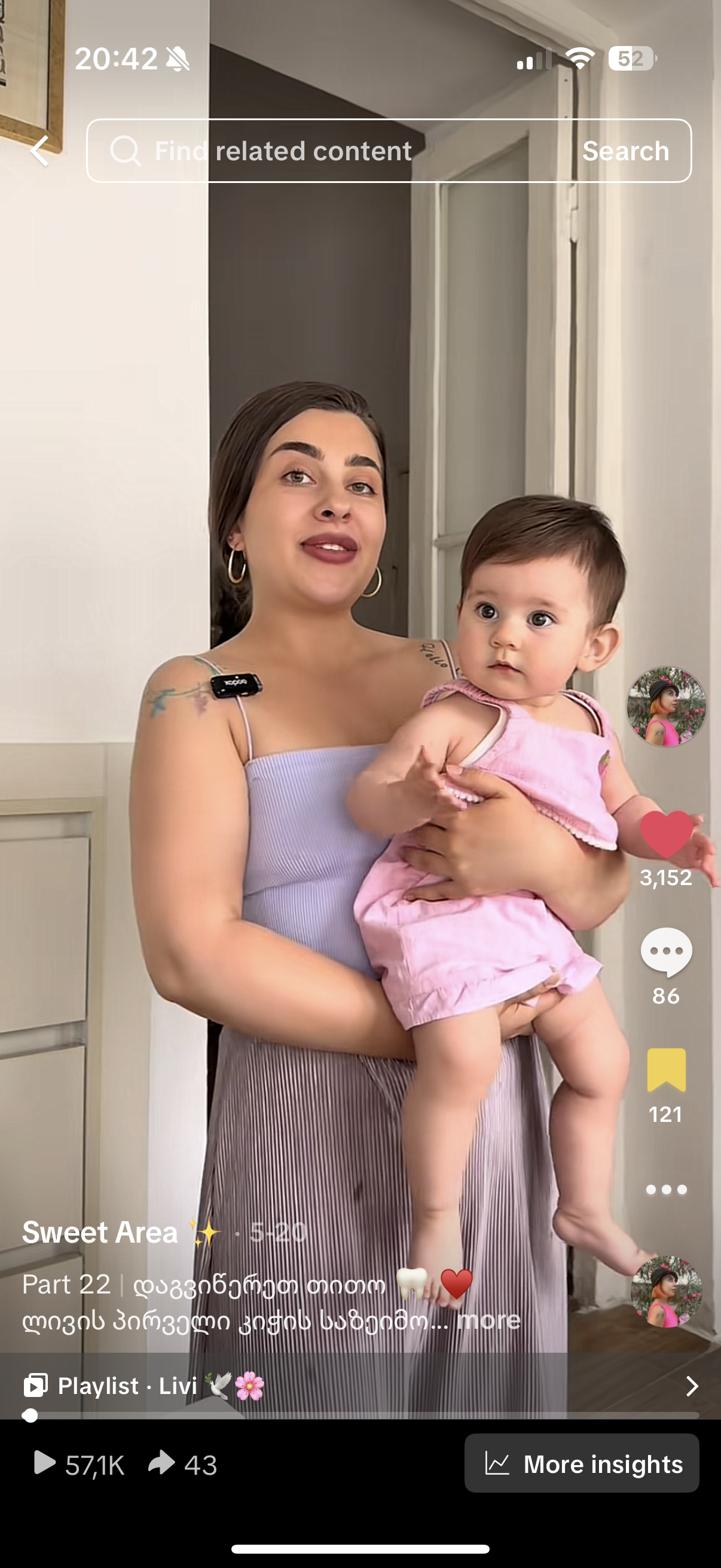 Woman with sunglasses walking down runway