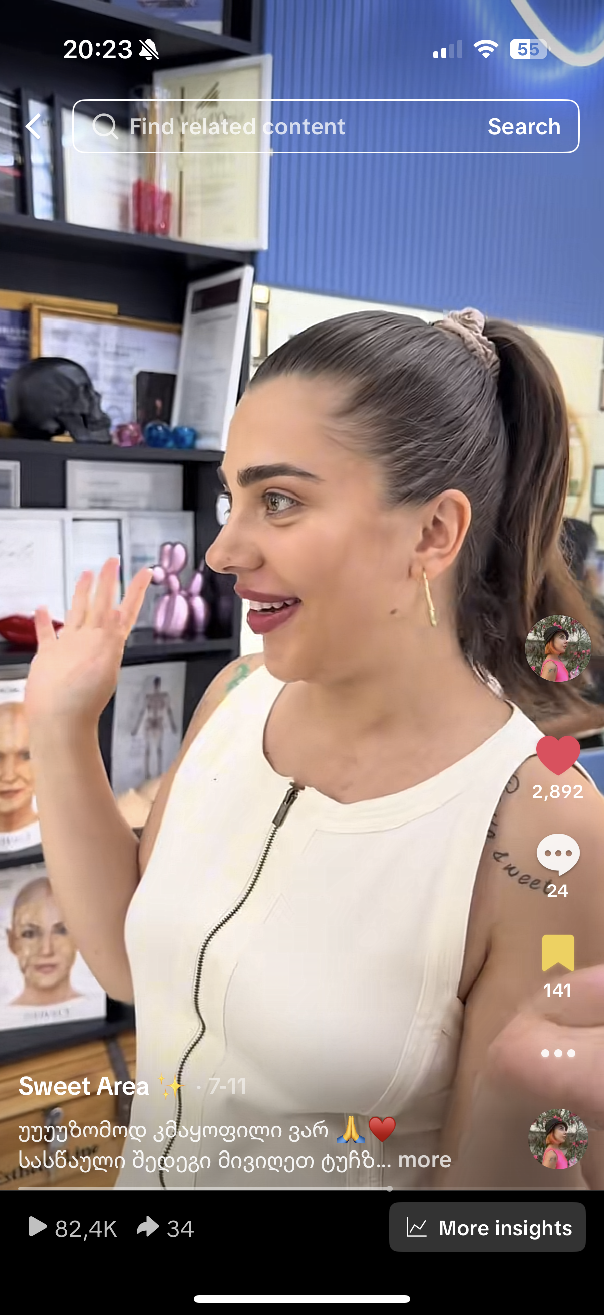 Woman with sunglasses walking down runway