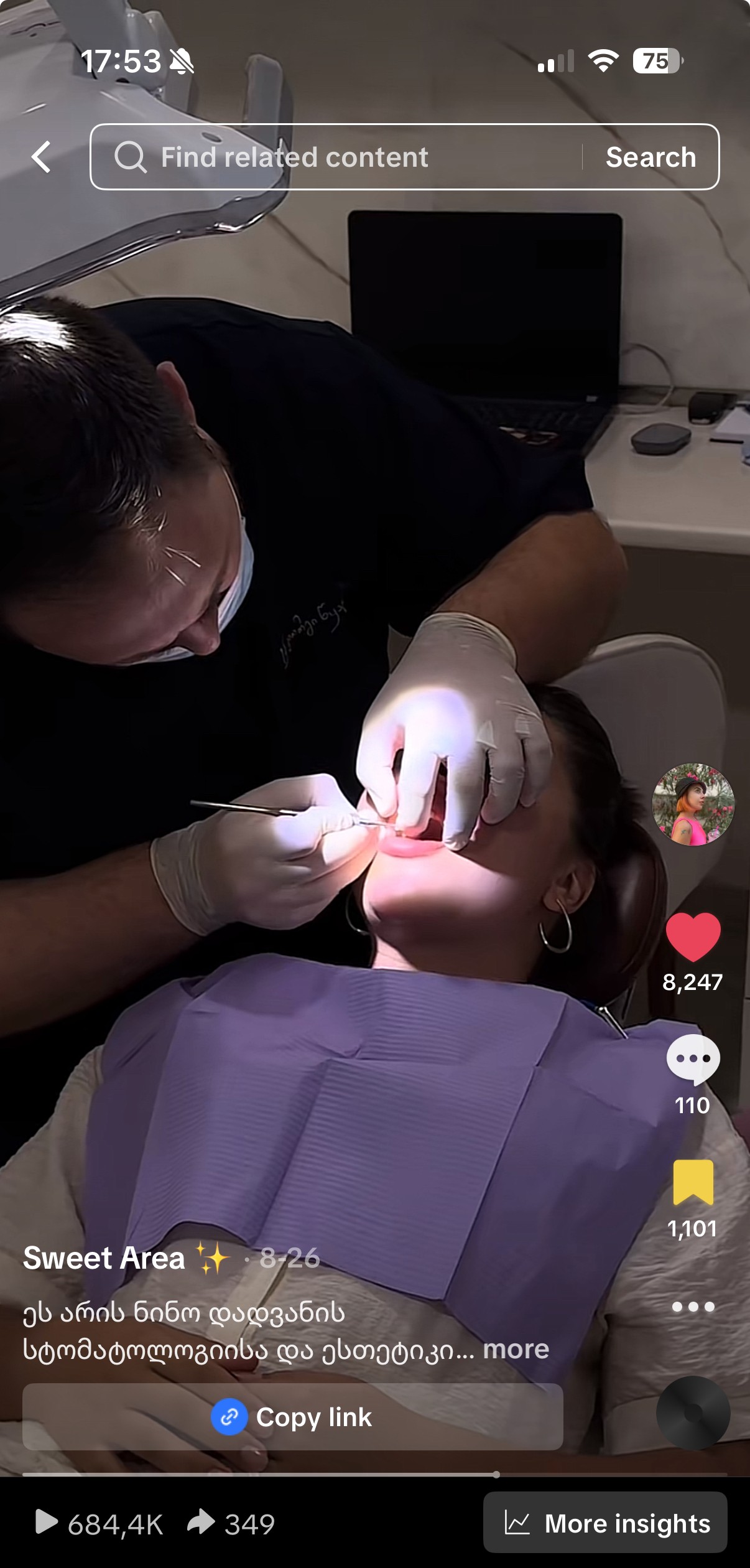 Woman with sunglasses walking down runway